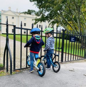 toddlers on bikes at National Trust Saltram