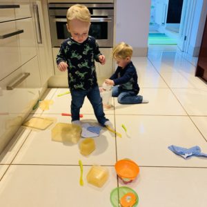 twins ransacking cupboards