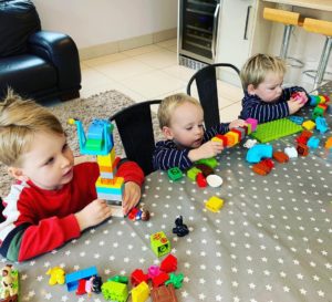 toddler and twins with duplo