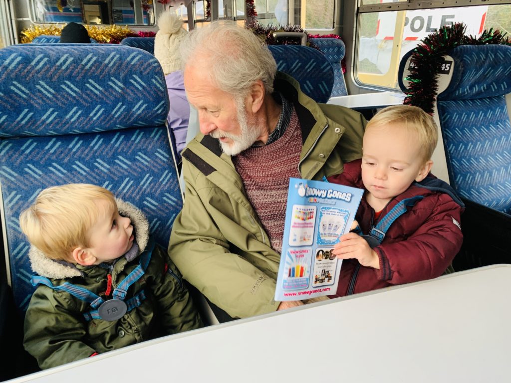 Grandad and twins on the santa train