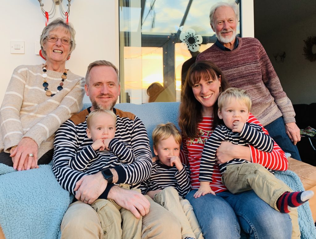 Twins, toddler and us with their grandparents