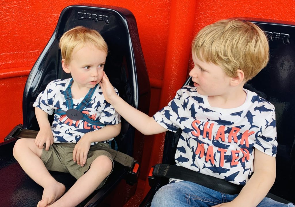 Brothers on the helicopter ride at Peppa Pig World