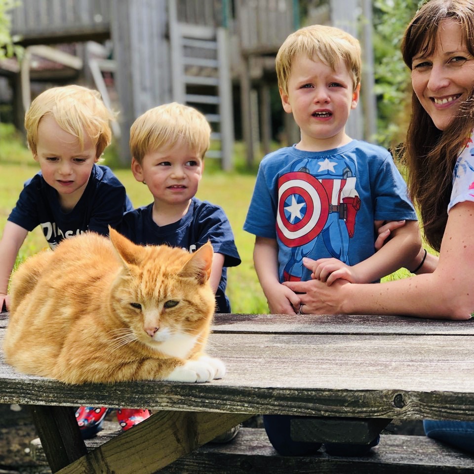 Oscar the cat with the boys and mummy