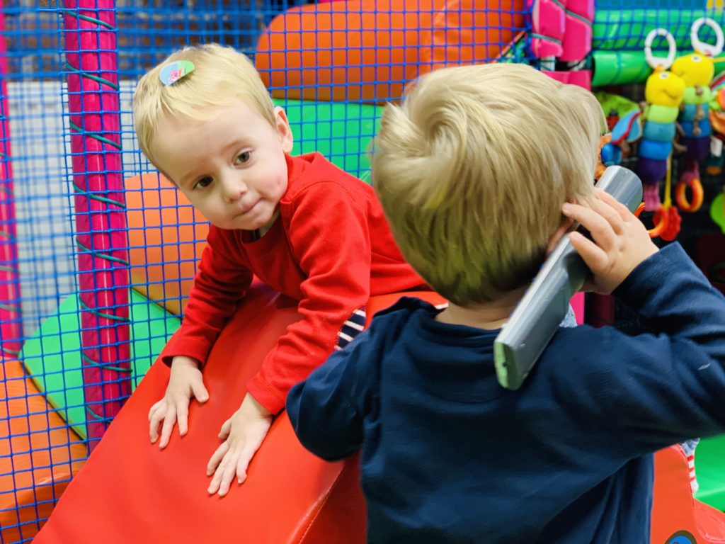 Twins enjoying soft play as a great idea of things to do indoors in Plymouth with kids