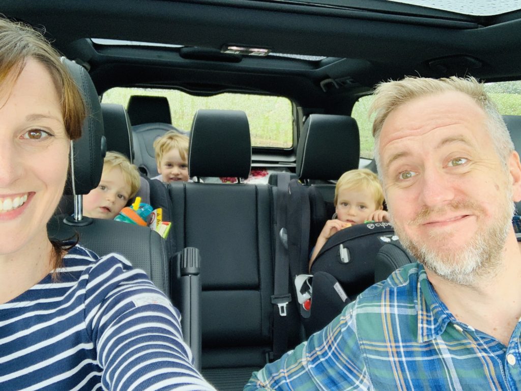 Family test driving a Discovery