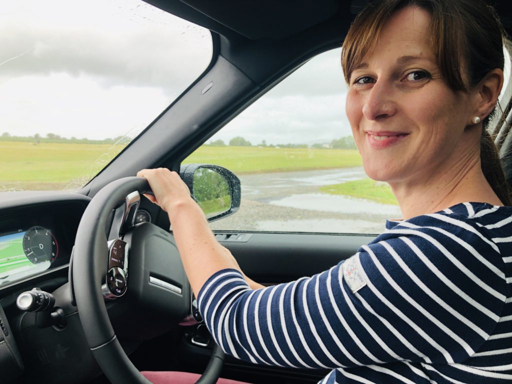 Mum driving a Land Rover Discovery