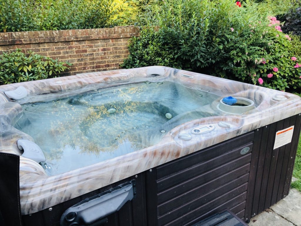 Hot tub in the garden at Greenwood Grange