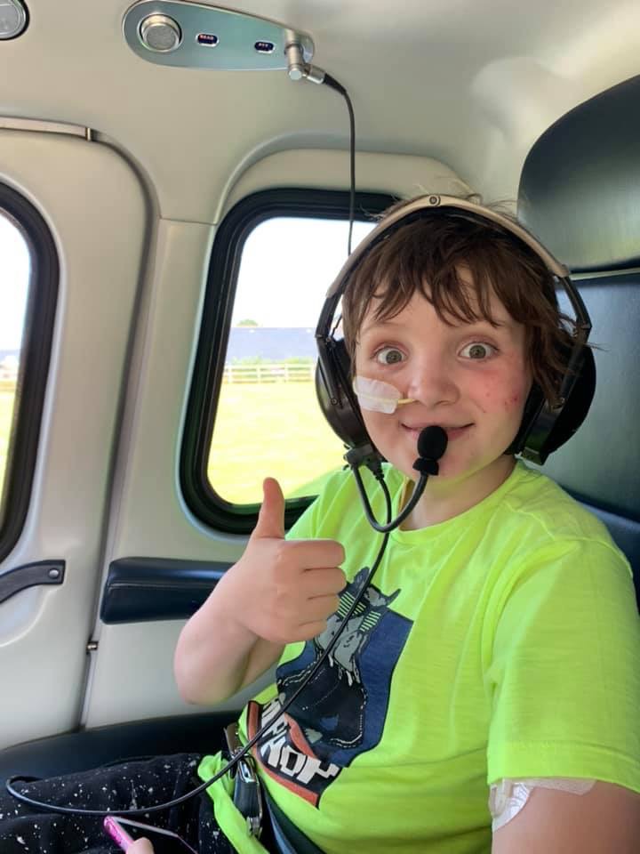 Oliver Brown in a helicopter