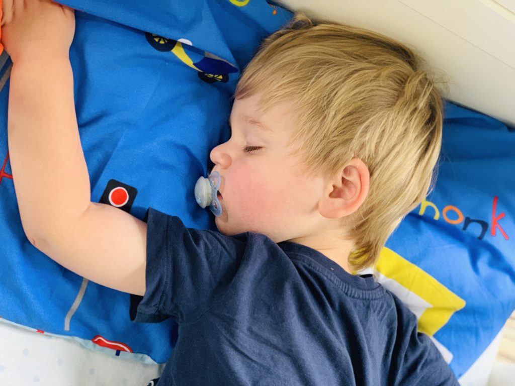 Toddler having a nap in his cot and not co-sleeping for once