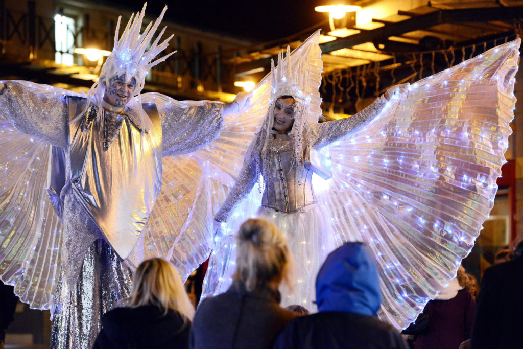 Frozen giants at a Christmas lights switch on