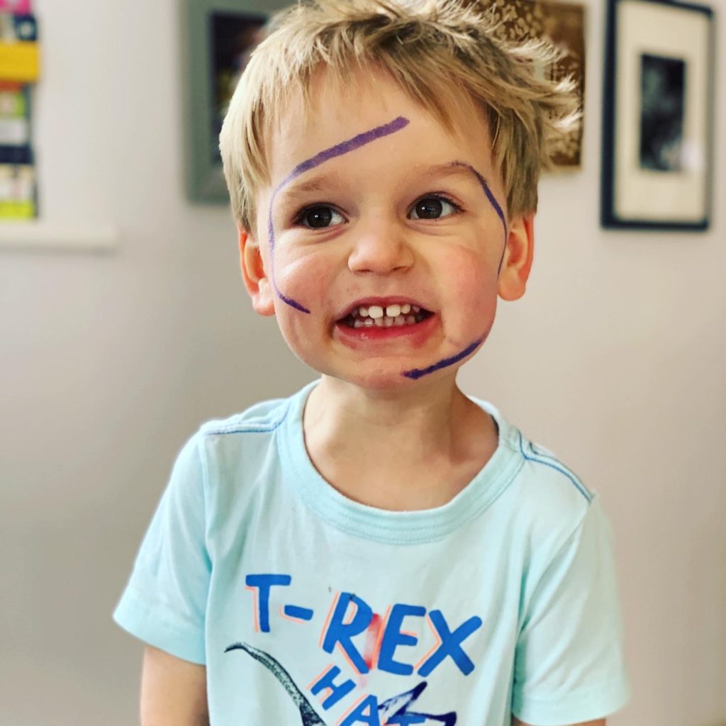 Toddler draws pen all over his face in lockdown