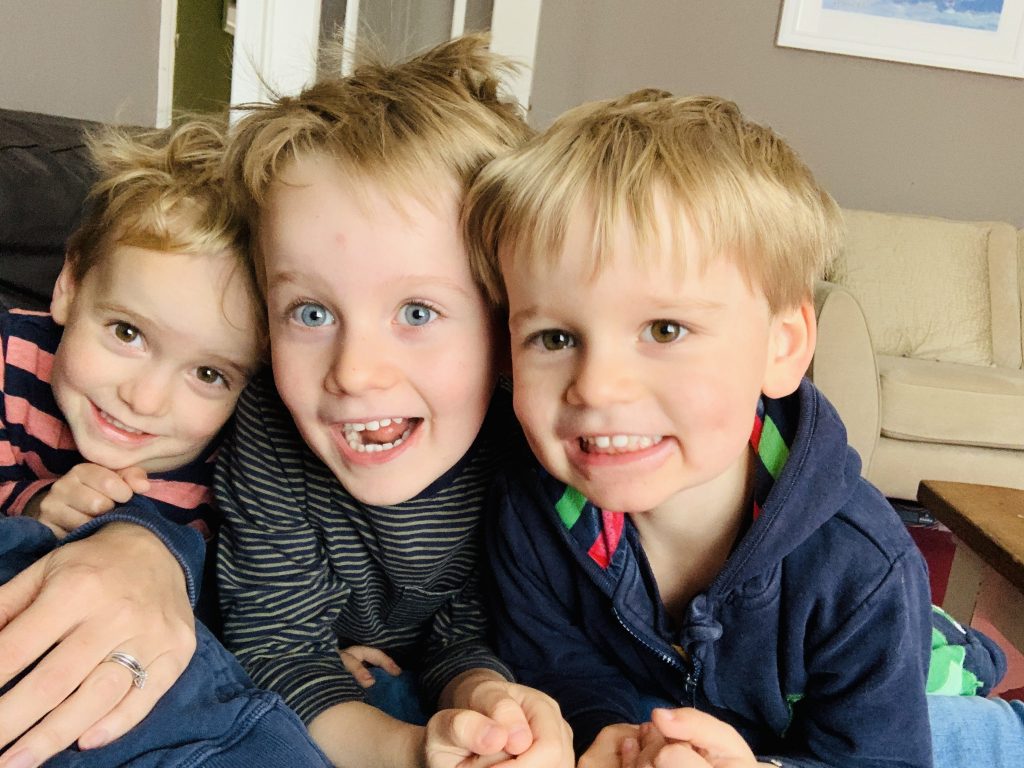 Twin two year old boys and their four year old big brother