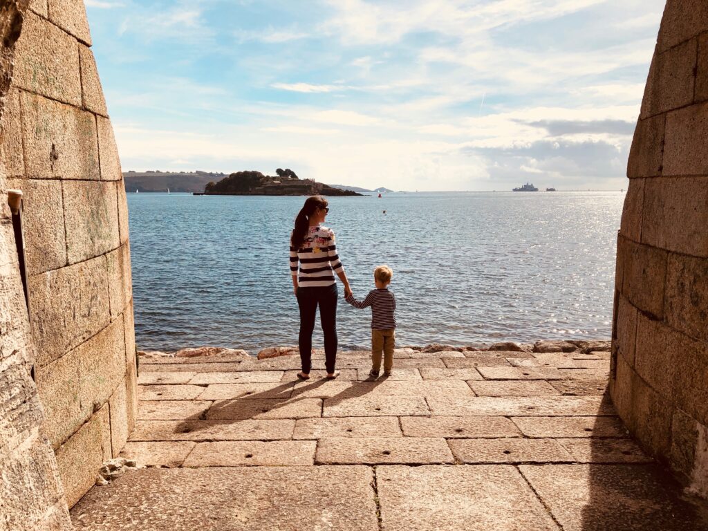 Mum and boy enjoying the view out to see from the Royal William Yard