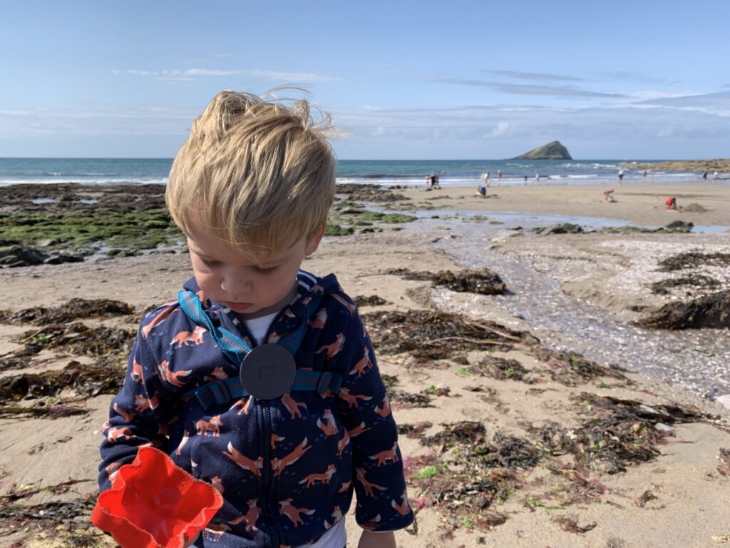 Toddler at Wembury Beach one of the best outdoor spaces in Plymouth