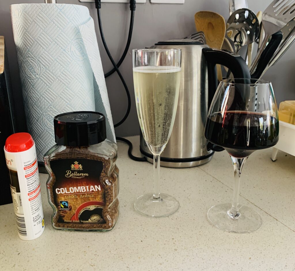 Coffee and prosecco on a kitchen work top