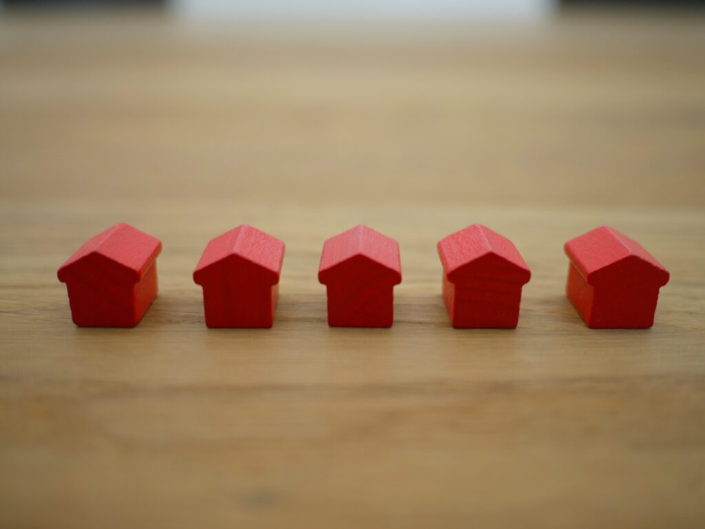 Mini wooden houses for a mortgage and retirement feature