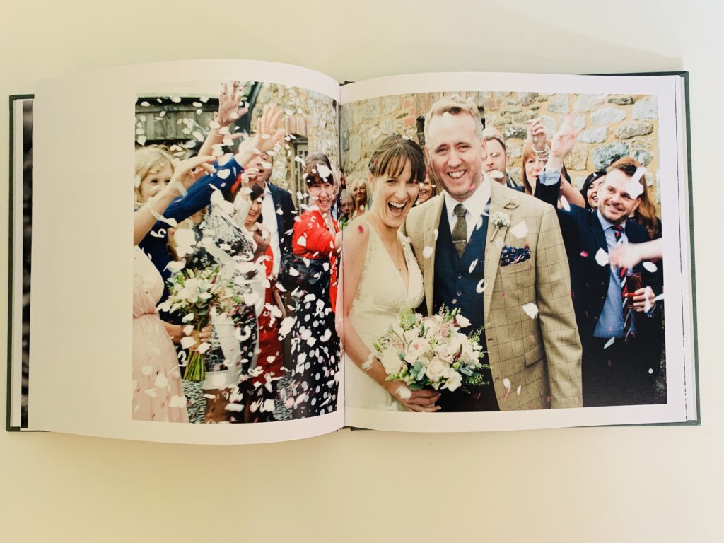 Wedding couple's confetti shot in a Rosemood photo book