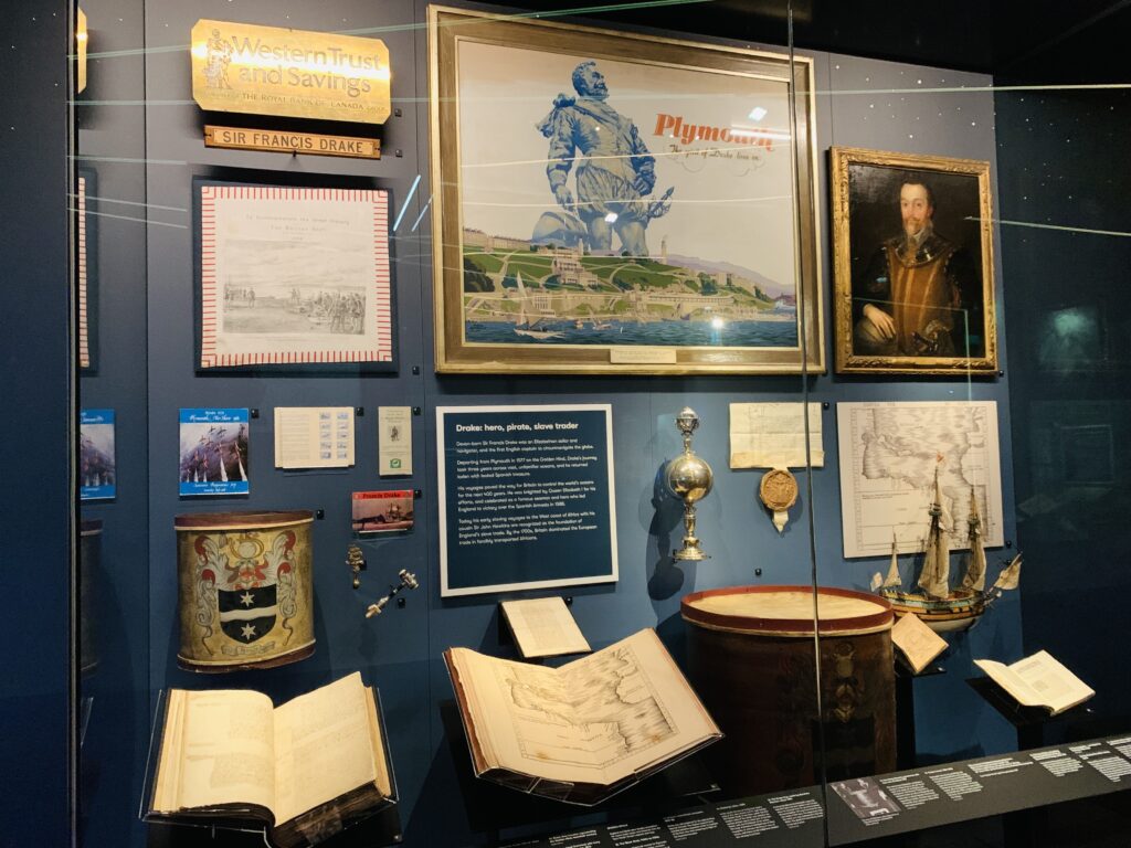 Sir Francis Drake artefacts including his atlas in a glass cabinet in The Box in Plymouth