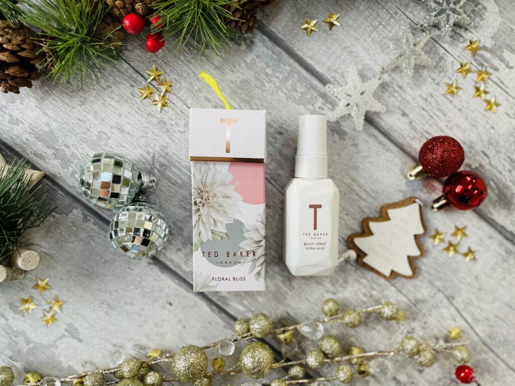 Boots Christmas gifts Ted Baker body spray surrounded by christmas decorations