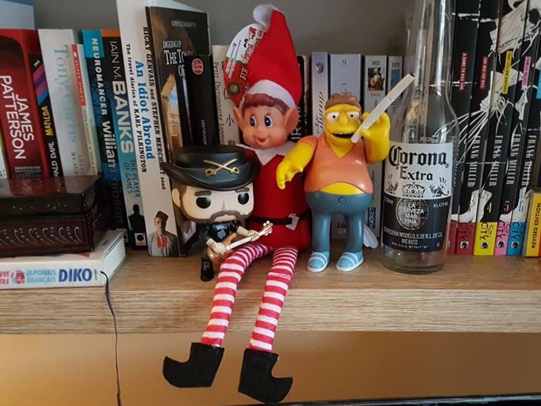 Elf toy - drinking and smoking