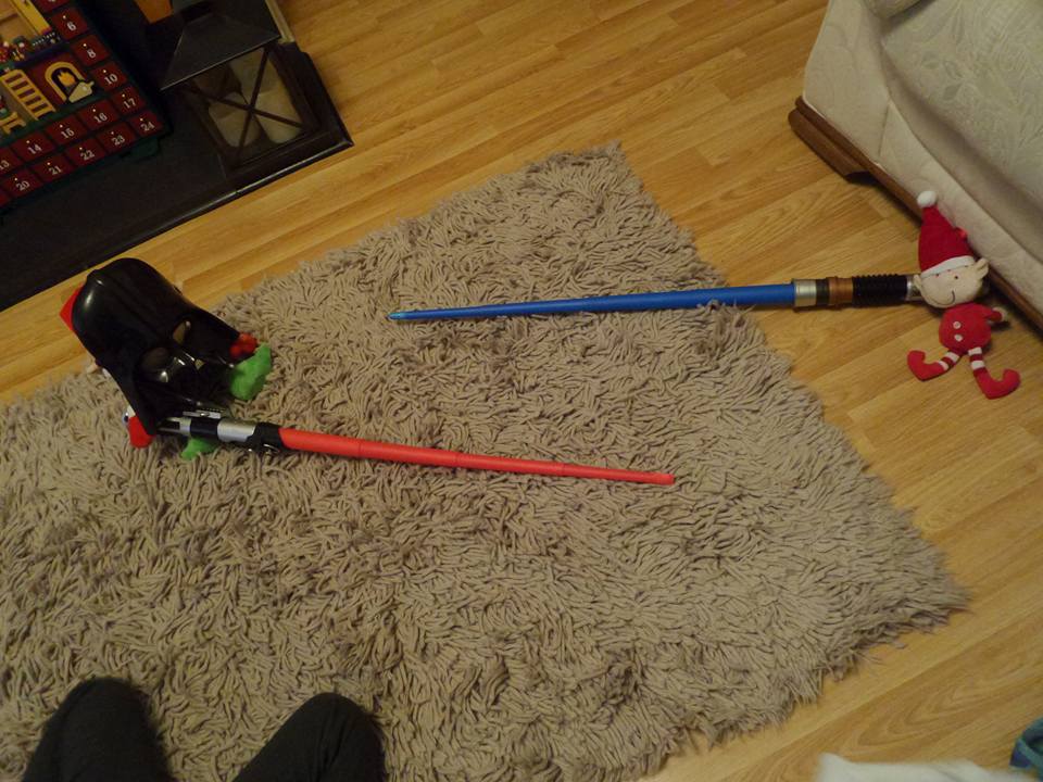 Elf on the shelf - darth vader light sabre fights