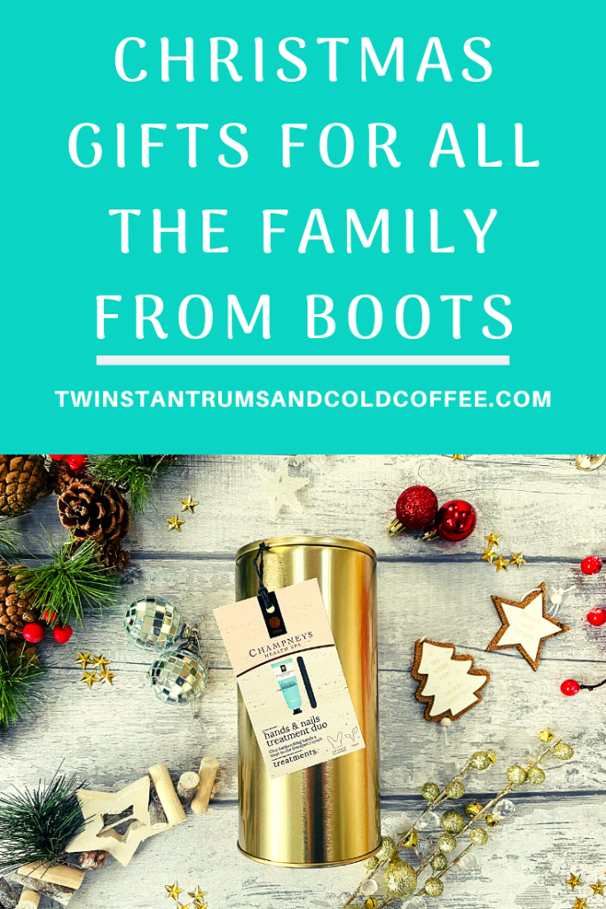 PIN image showing a gold tin of hand cream from Champneys surrounded by Christmas decorations to promote a Boots gift guide