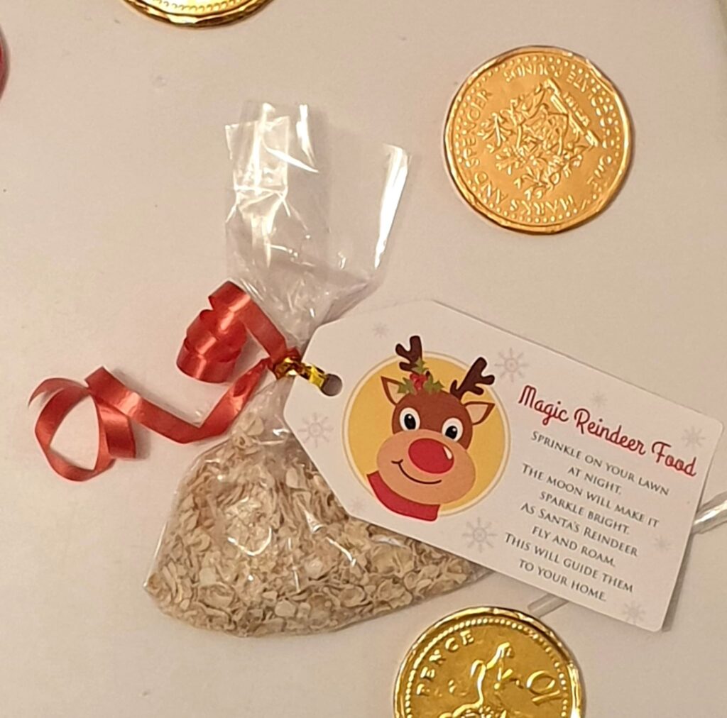 Bag of reindeer food with a label and chocolate coins. An idea for Christmas Eve Boxes.