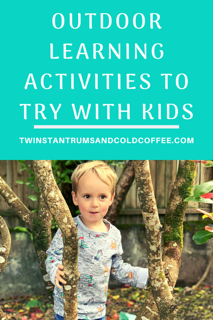 Ideas for outdoor learning activities with a three year old boy stood amongst trees