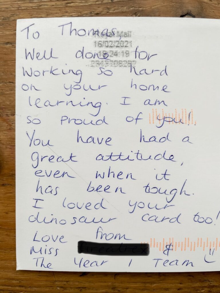 Handwritten postcard from teacher to year one pupil