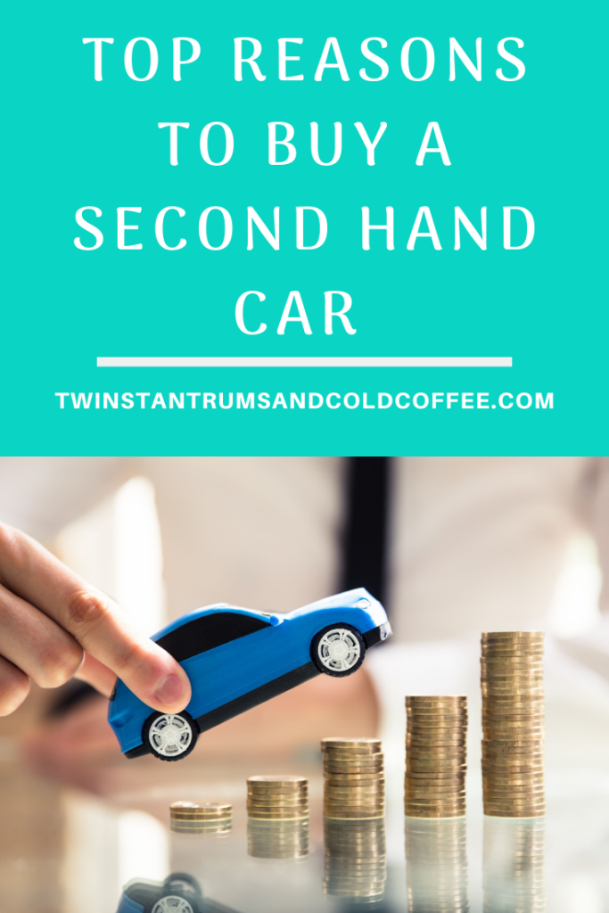 A blue toy car and some coins for a post on reasons to buy a second hand car