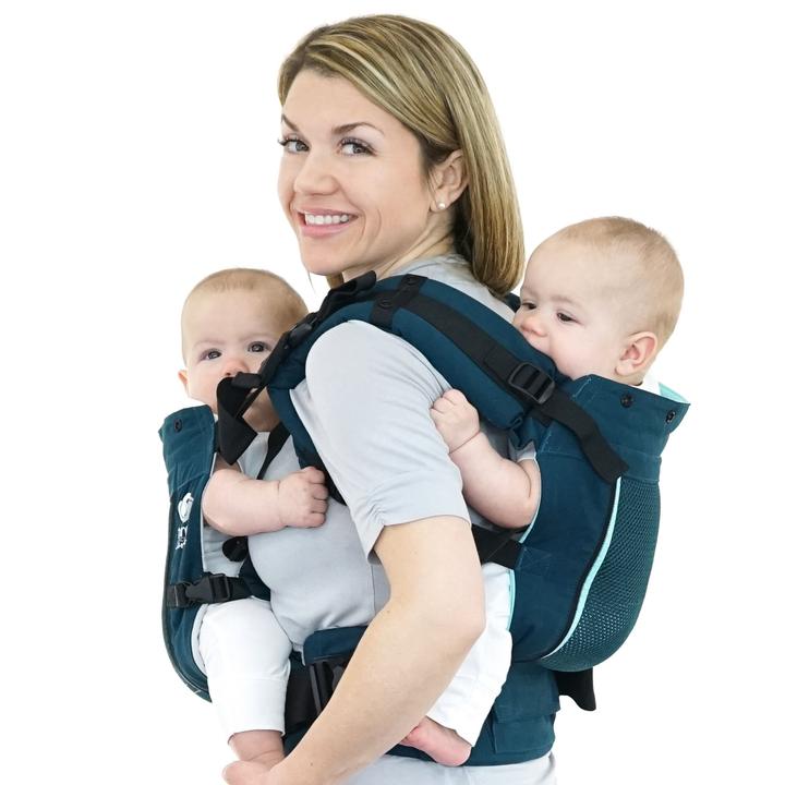 A TwinGo double baby carrier will help when travelling with twins