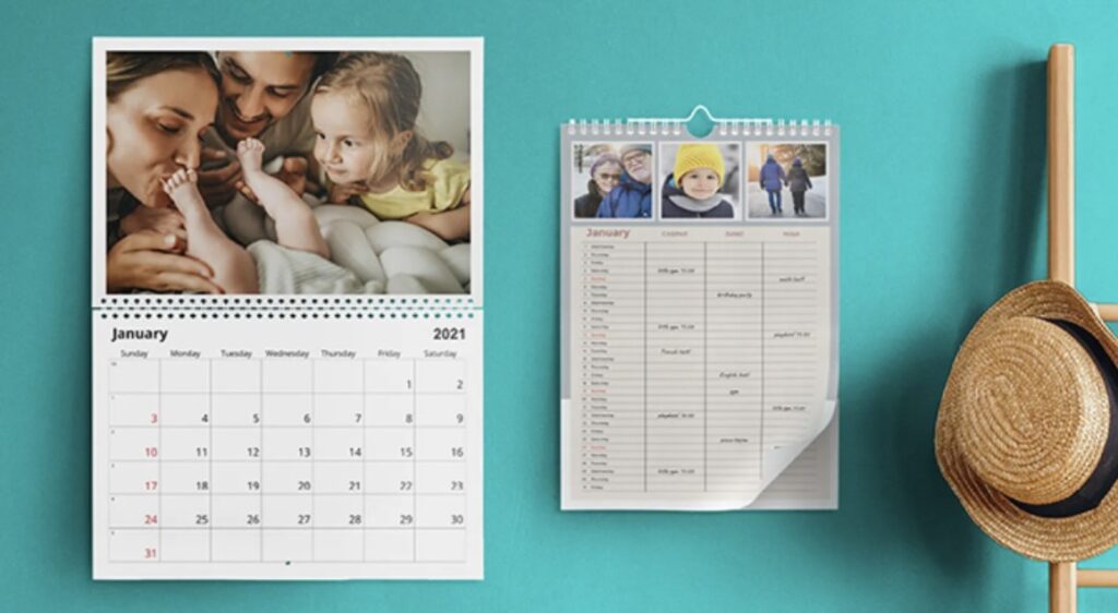 Bonusprint photo calendars on a blue wall