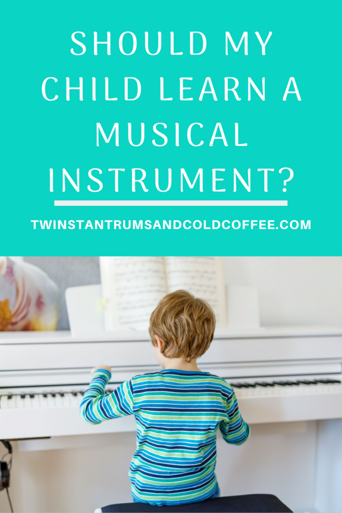 PIN image of a child learning an instrument playing the piano