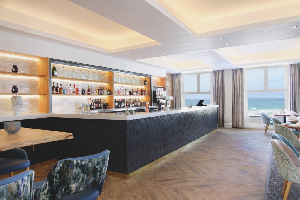 The bar area overlooking Fistral beach of the Esplanade hotel in Cornwall