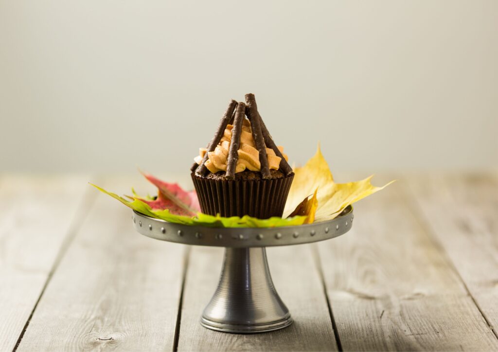 Autumn baking ideas include a bonfire night cupcake