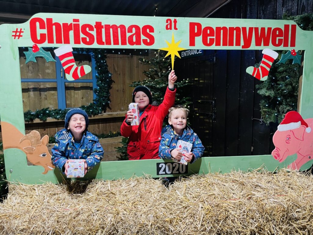 Brothers with presents after going to a Christmas experience at Pennywell