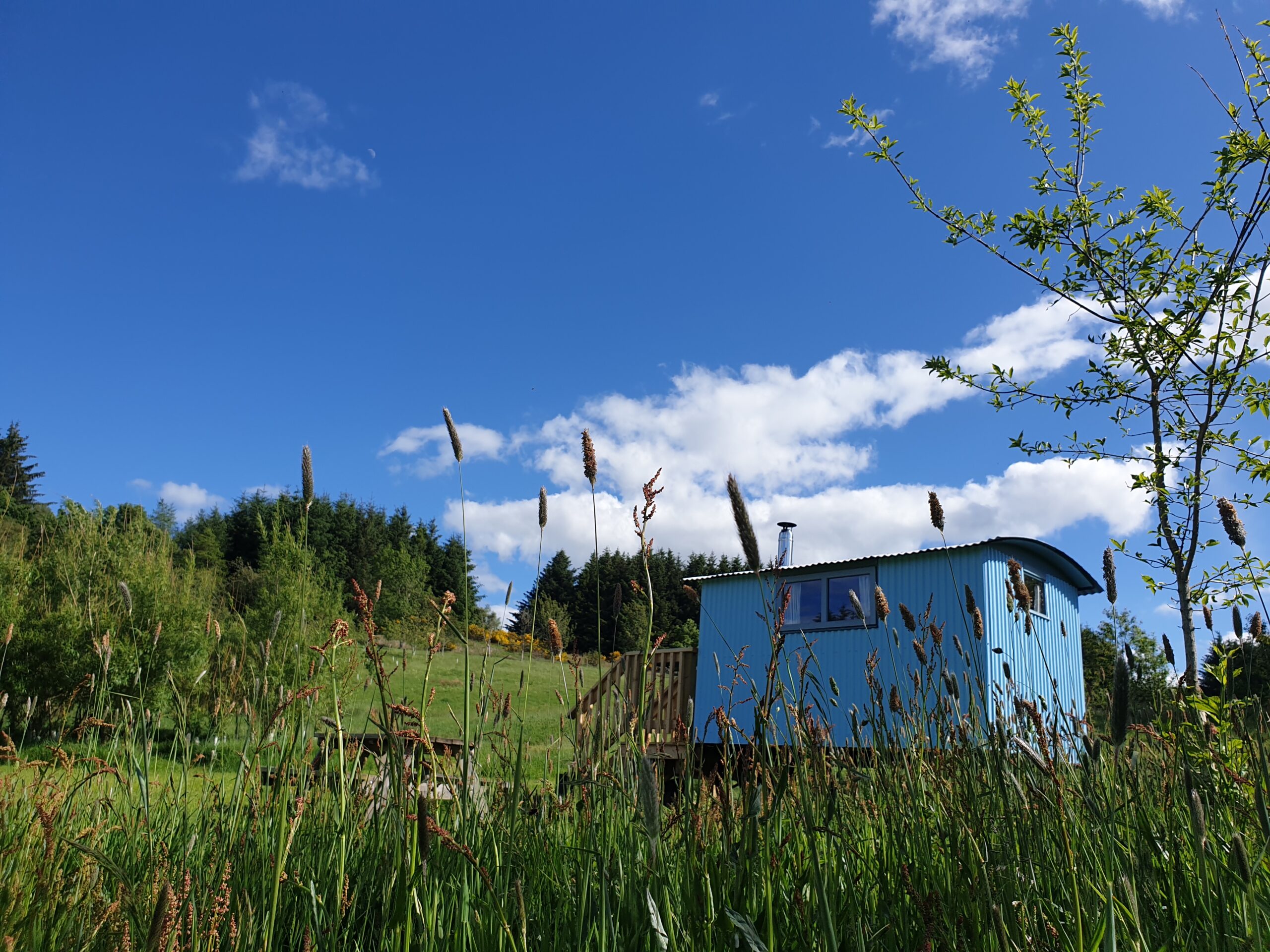 Blue hut at Glenshee one of the best glamping sites in the UK