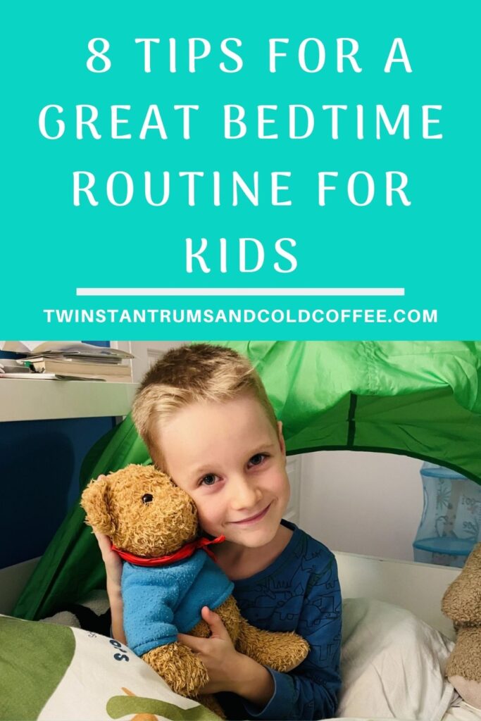 Pin image of a child with a teddy in bed