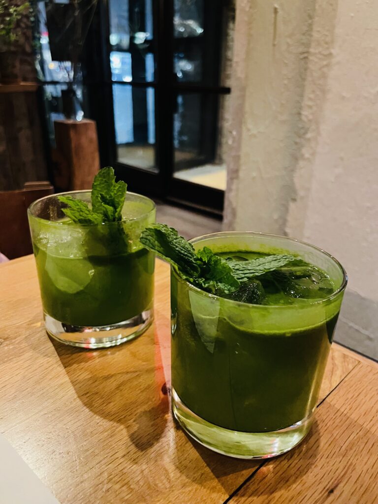 Green cocktails in a bar in manhattan