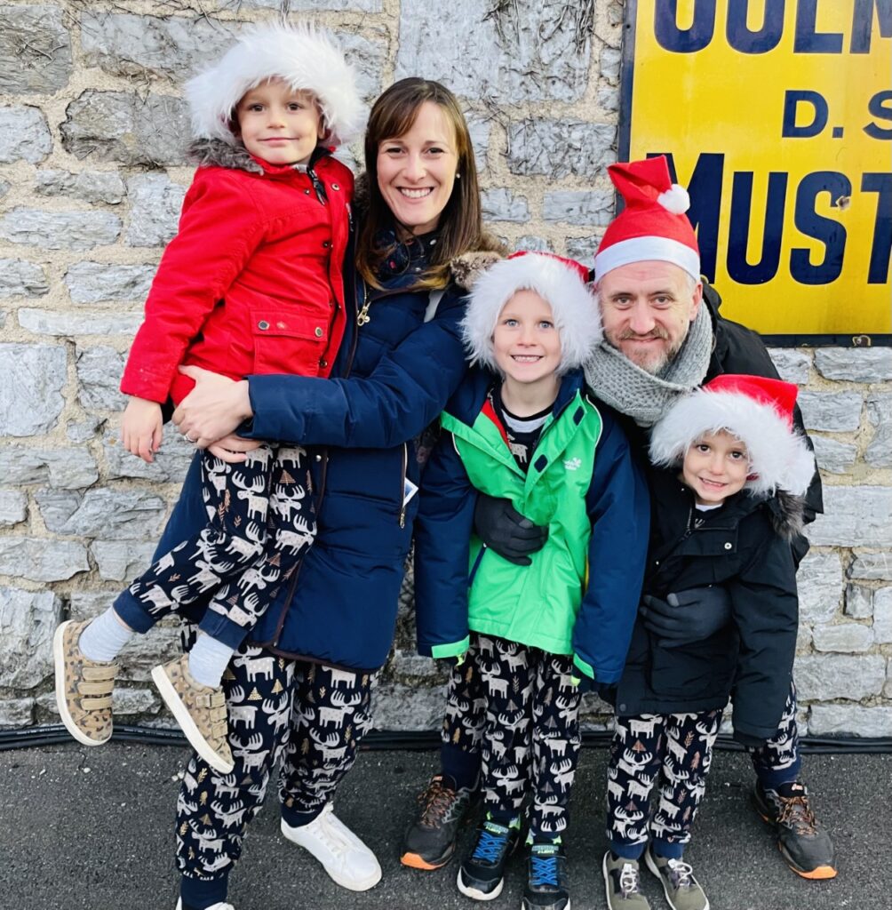 A family dressed in matching Christmas pyjamas ready for the polar express at south devon railway