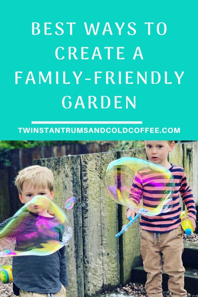 Boys blow bubbles in a family friendly garden