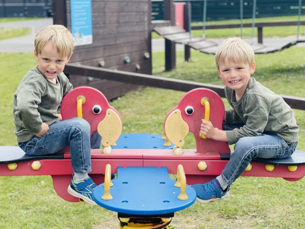 Twin boys on a see-saw