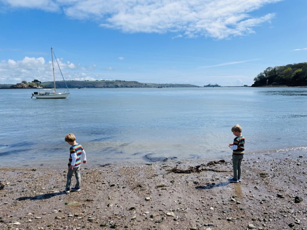Twin brothers playing by the sea at Mount Edgcumbe