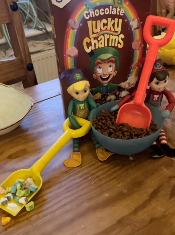 Elves digging in the cereal bowl by Saira Franklin