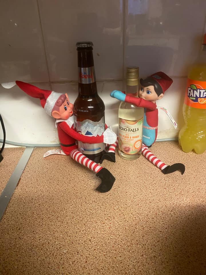 Elf on the Shelf drinking wine and beer by Georgina Morris