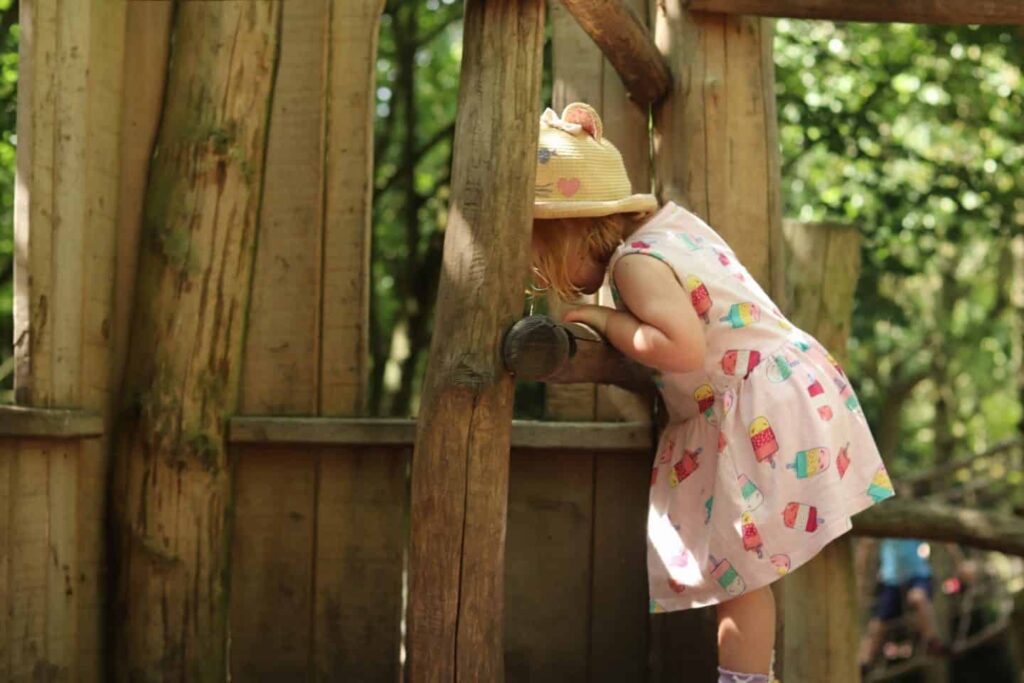 A girl plays at Fountains Abbey run by the National Trust