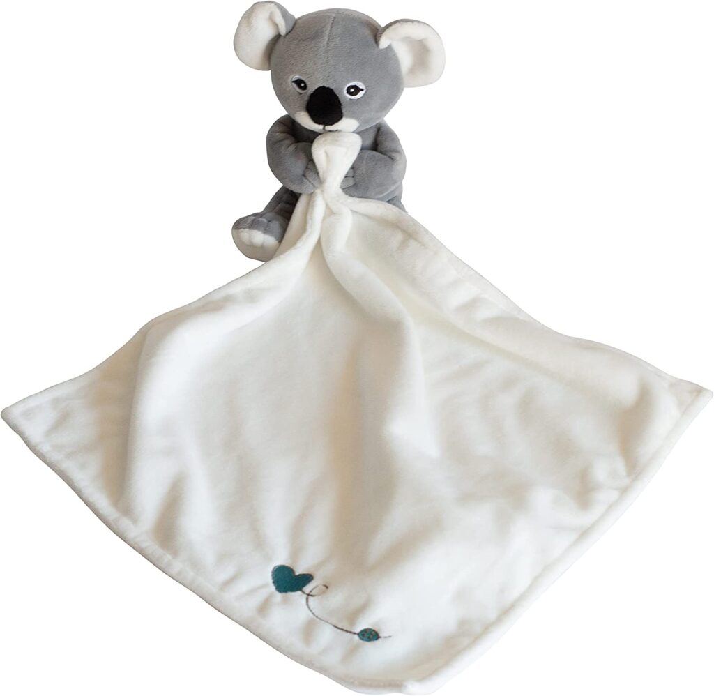 New born baby blanket or comforter with a koala attached to it