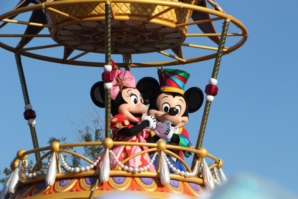 Mickey and Minnie Mouse on a hot air balloon ride at Disney