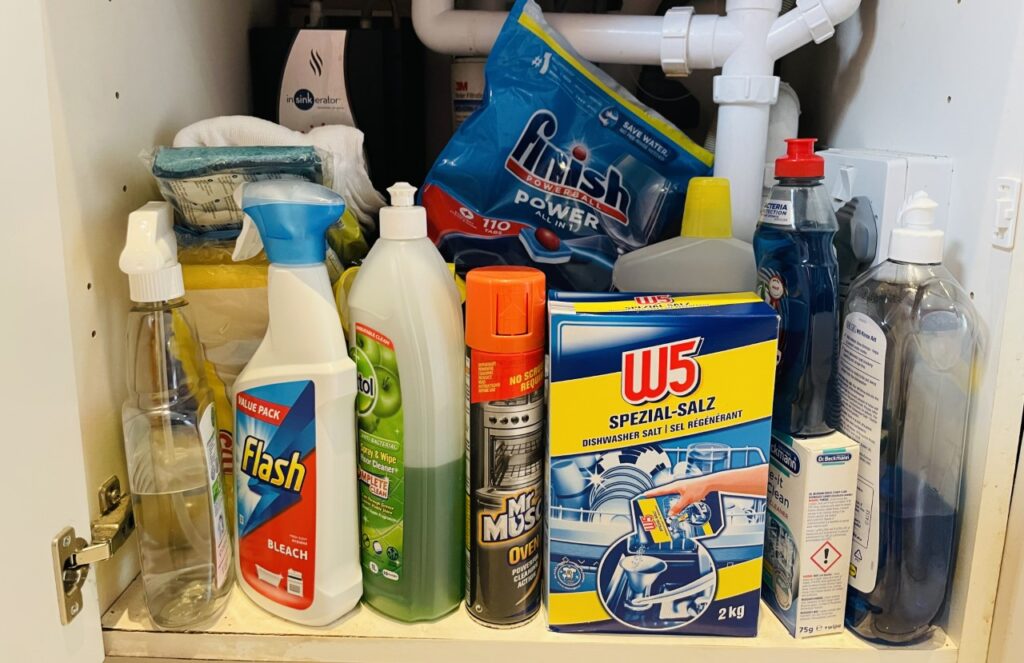 A cupboard of cleaning products needs to be locked or moved to baby proof your home