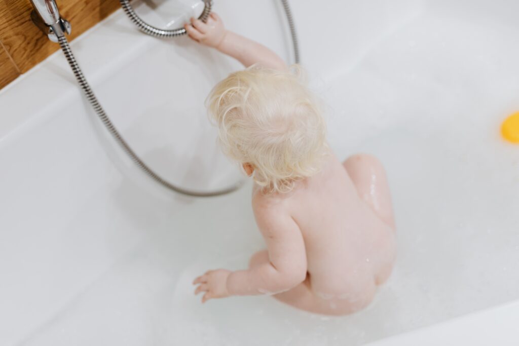 A baby in a bath